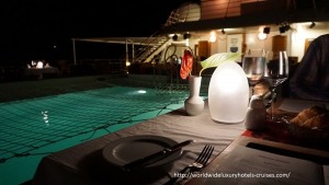 Paul Gauguin Cruises Tahiti & Society Islands Luxury Travel Virtuoso Izumi Ogawa Trip agent vacation advisor Vision French Polynesia Cruise ship boat ocean water sand beach Moorea shark stingray