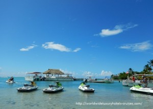 Paul Gauguin Cruises Tahiti & Society Islands Luxury Travel Virtuoso Izumi Ogawa Trip agent vacation advisor Vision French Polynesia Cruise ship boat ocean water sand beach Moorea shark stingray