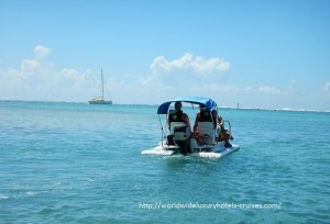 Paul Gauguin Cruises Tahiti & Society Islands Luxury Travel Virtuoso Izumi Ogawa Trip agent vacation advisor Vision French Polynesia Cruise ship boat ocean water sand beach Moorea shark stingray