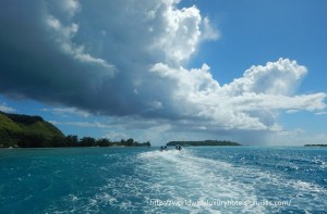 Paul Gauguin Cruises Tahiti & Society Islands Luxury Travel Virtuoso Izumi Ogawa Trip agent vacation advisor Vision French Polynesia Cruise ship boat ocean water sand beach Moorea shark stingray