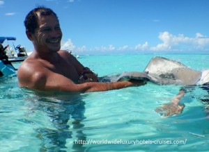 Paul Gauguin Cruises Tahiti & Society Islands Luxury Travel Virtuoso Izumi Ogawa Trip agent vacation advisor Vision French Polynesia Cruise ship boat ocean water sand beach Moorea shark stingray