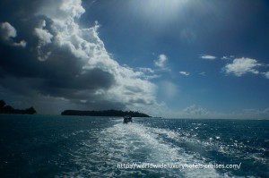 Paul Gauguin Cruises Tahiti & Society Islands Luxury Travel Virtuoso Izumi Ogawa Trip agent vacation advisor Vision French Polynesia Cruise ship boat ocean water sand beach Moorea shark stingray