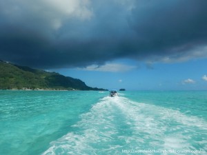 Paul Gauguin Cruises Tahiti & Society Islands Luxury Travel Virtuoso Izumi Ogawa Trip agent vacation advisor Vision French Polynesia Cruise ship boat ocean water sand beach Moorea shark stingray