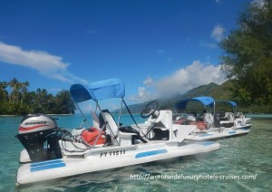 Paul Gauguin Cruises Tahiti & Society Islands Luxury Travel Virtuoso Izumi Ogawa Trip agent vacation advisor Vision French Polynesia Cruise ship boat ocean water sand beach Moorea shark stingray