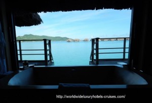 Four Seasons Resort overwater bungalow snorkel room bath bed Tahiti Society Islands Luxury Travel Virtuoso Izumi Ogawa Trip agent vacation advisor Vision French Polynesia Cruise ship boat Bora Bora ocean water sand beach